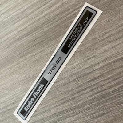 Radio Shack TRS-80 Model III silver sticker badge domed
