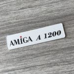 Amiga 'Escom' badge 0.5mm thick