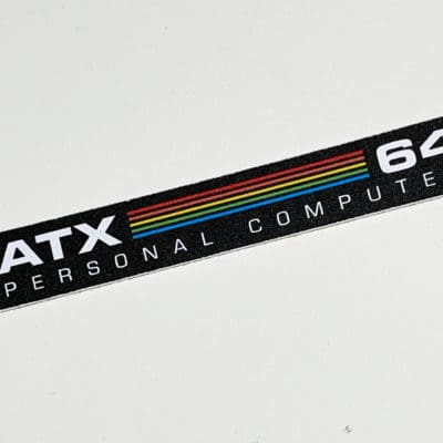 Commodore 64C 'ATX' black replacement badge 0.5mm thick