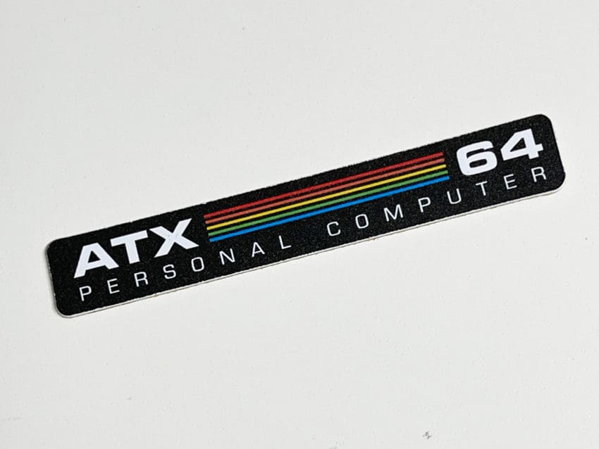 Commodore 64C 'ATX' black replacement badge 0.5mm thick