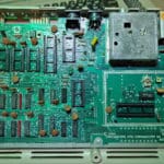 Commodore 64 mainboard with sockets. No warranty. Has bad colour ram chip.