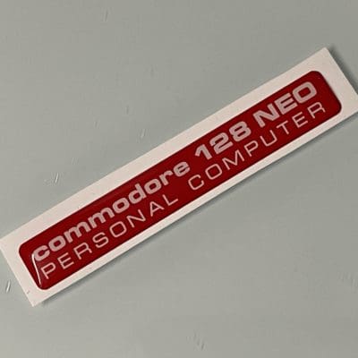 C128 NEO badge red
