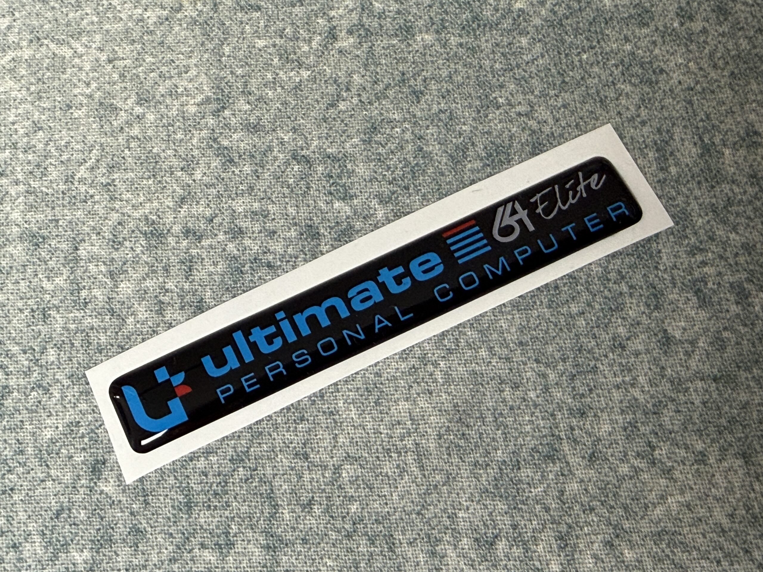 Ultimate 64 Elite SX style badge (C64C)